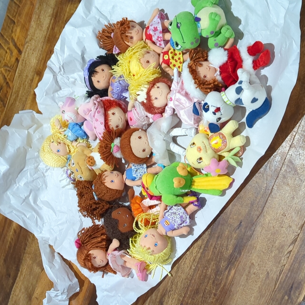 Strawberry shortcake 8" plush dolls and pets.